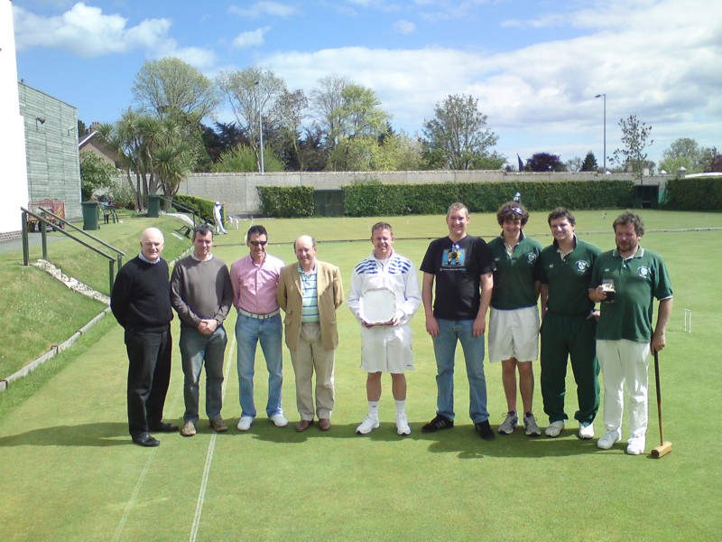 The teams show the trophy before the final games are completed.